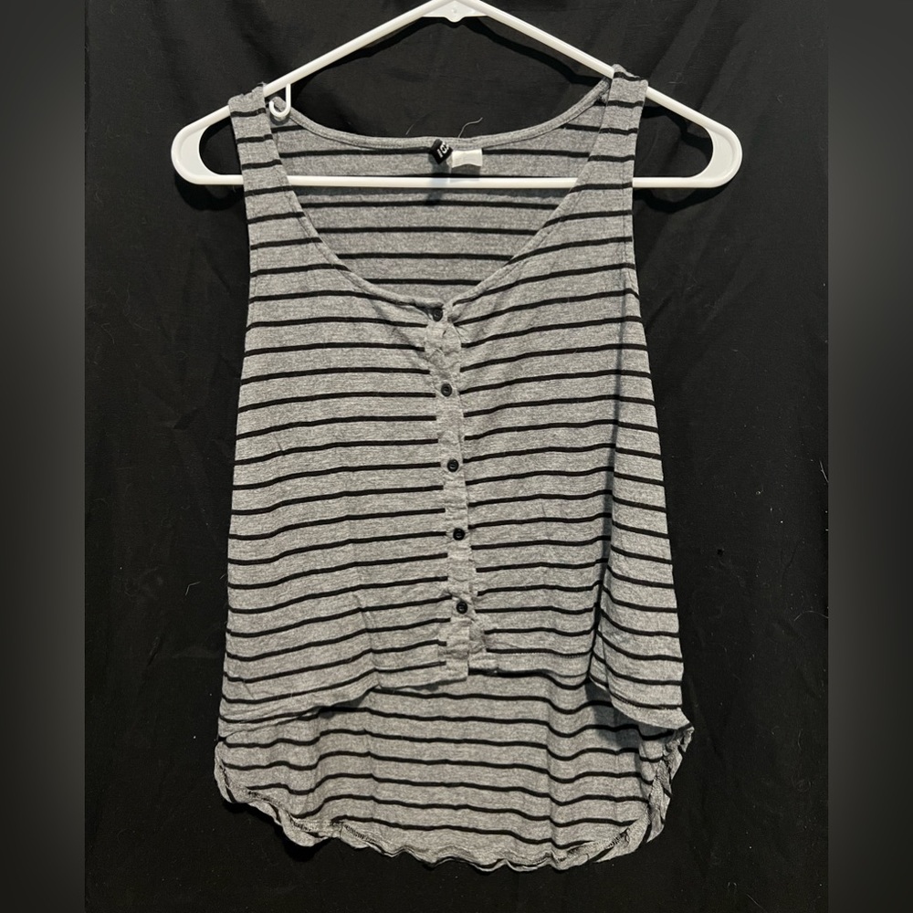 Woman’s divided small grey and black stripped tank top